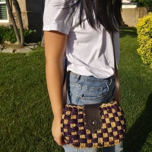 Purple weaved bag